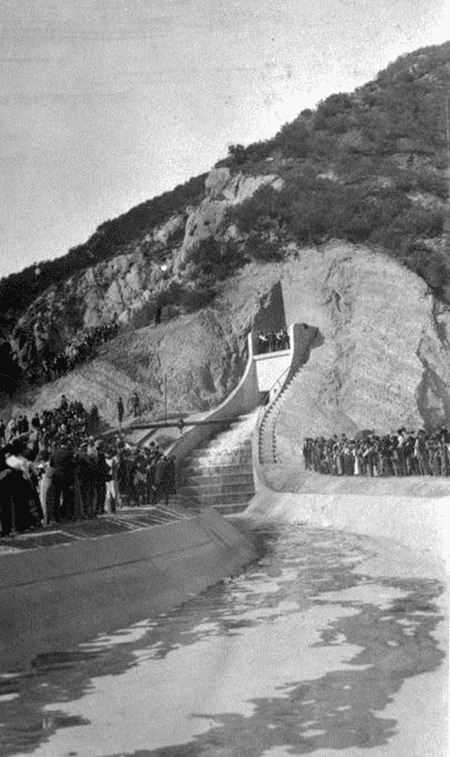 Official Opening of the Water Gates - After the crowds are cleared from the hillside and the speeches completed, the water gates are opened and the LA Aqueduct water starts to flow.*
