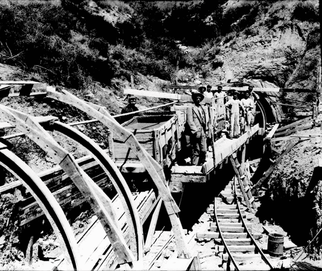(ca. 1908)* - Workers preparing tunnel for cement lining.
