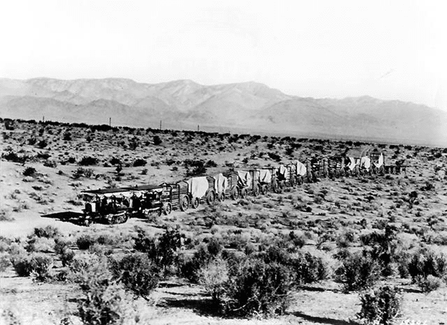 (1909)^ - Two Holt 45 gas crawling-type ("caterpillar") tractors team up to pull a long wagon train in the Mojave Desert during construction of the Los Angeles Aqueduct.
