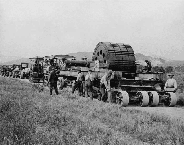 (ca. 1910)# - Truck fleet and Holt caterpillar traction engine transporting materials and machinery to an aqueduct construction site.