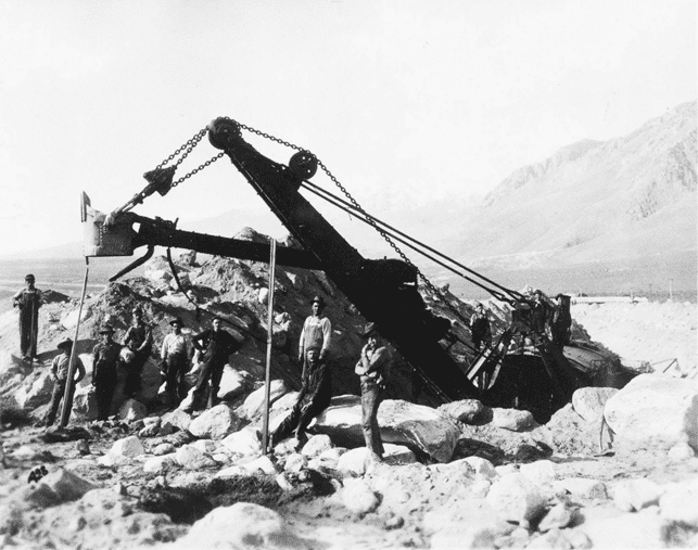 (ca. 1912)* - Marion steam shovel excavating the open concrete-lined section of the Los Angeles Aqueduct in southern Owens Valley.
