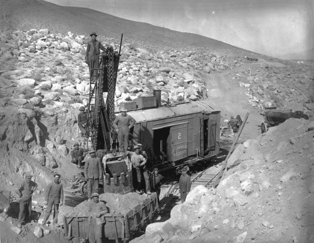 (ca. 1912)* - Labor crew by steam shovel No. 2 posing for the camera.