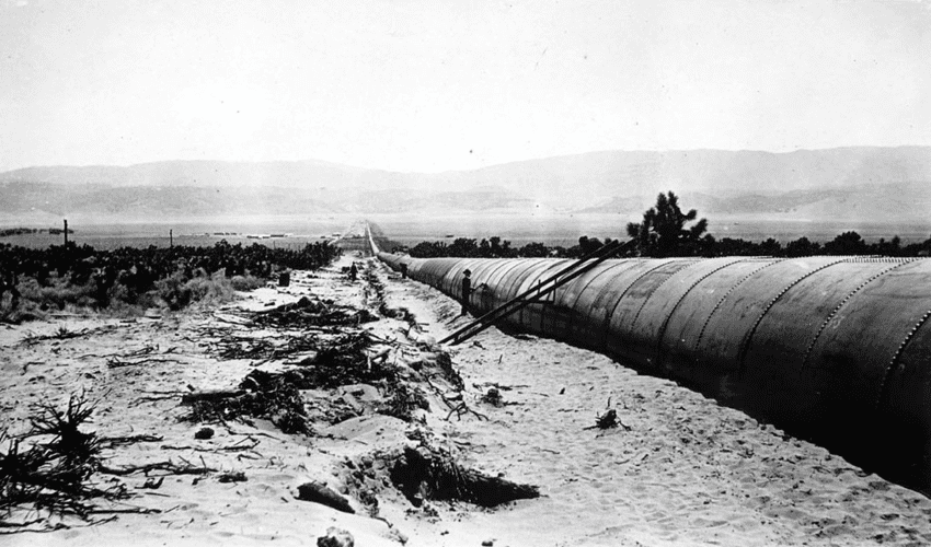 (ca. 1913)^# - View showing the longest section of steel pipe along the aqueduct, running through Antelope Valley.