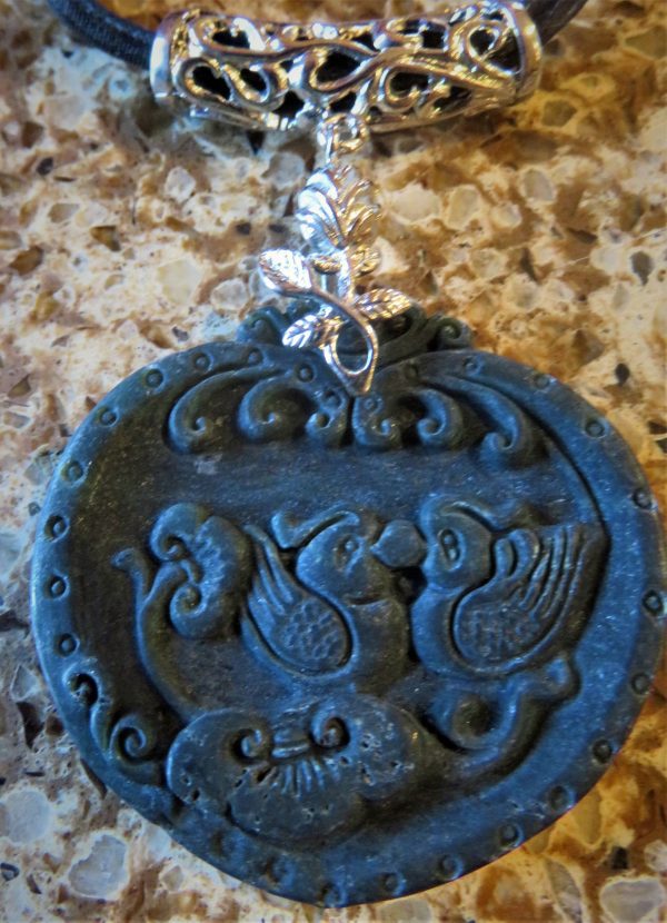 HAND CARVED LAVA ROCK PENDANT